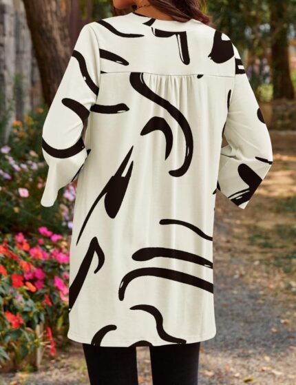 Three-Quarter Sleeve V-Neck Tunic Top with Side Slit
